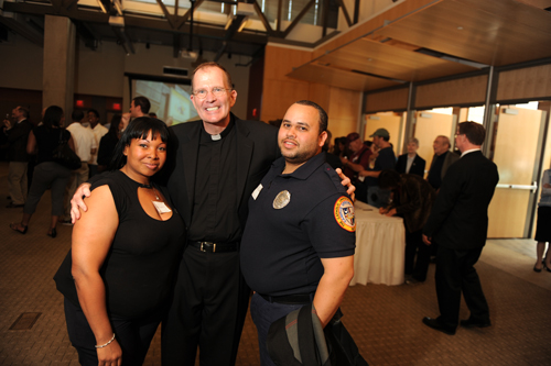 Father O'Connell with Department of Public Safety  staff