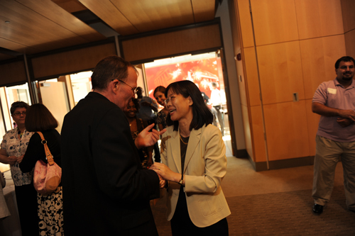 Father O'Connell with Ingrid Hsieh-Yee